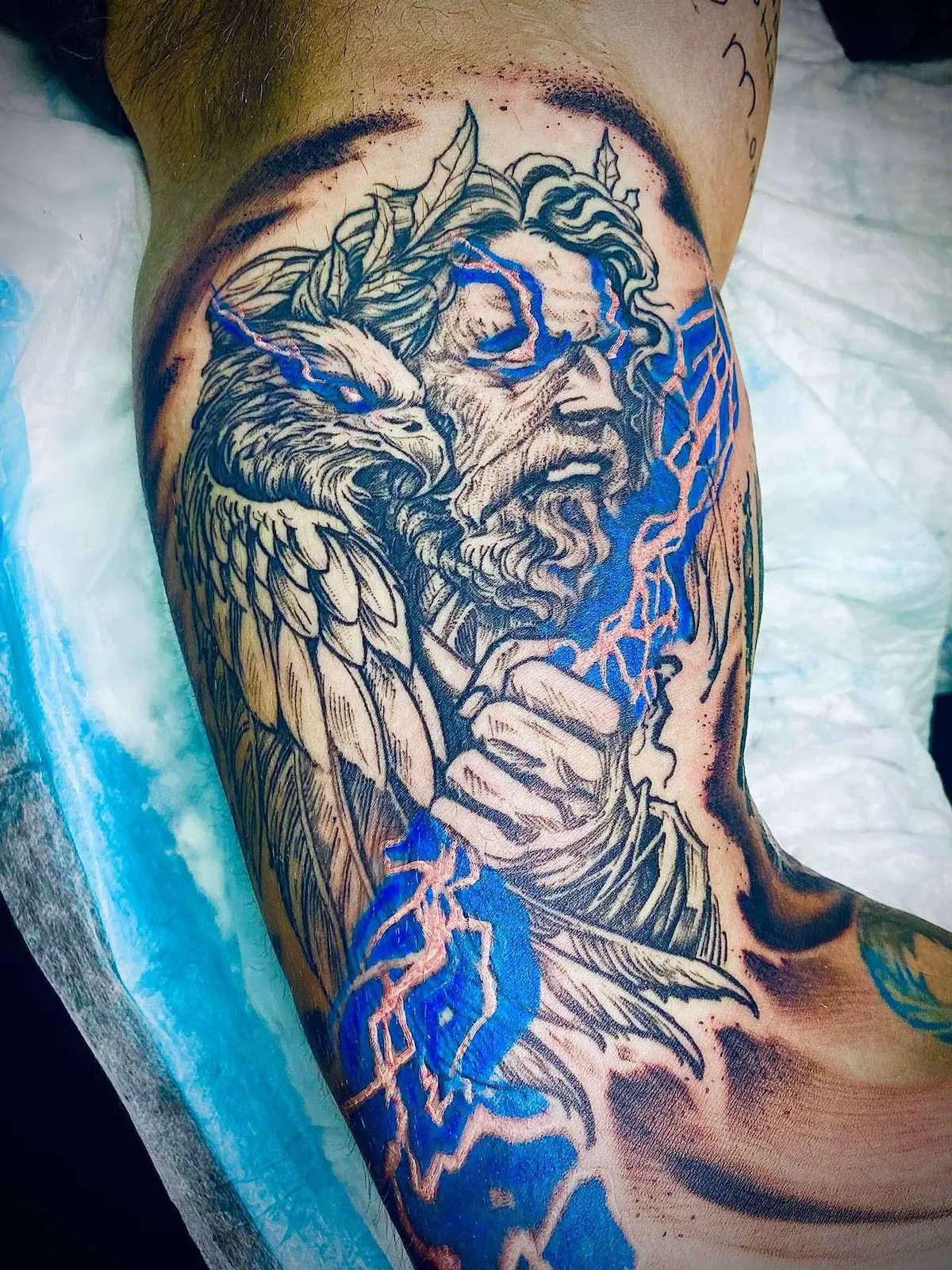 Colored Bicep sleeve of Zeus, a hawk, and lightning designs Colored Bicep sleeve of Zeus, a hawk, and lightning designs